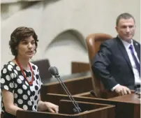  ?? (Itzik Harari/Knesset) ?? MERETZ CHAIRWOMAN Tamar Zandberg speaks from the Knesset podium yesterday as Speaker Yuli Edelstein looks on.