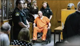  ?? JASON HENRY / NEW YORK TIMES ?? Joseph James DeAngelo, who is suspected of being the Golden State Killer, is wheeled into the courtroom by a bailiff during his arraignmen­t hearing at the Sacramento County Sheriff’s office on Friday. To solve the decades-old serial rape and murder...