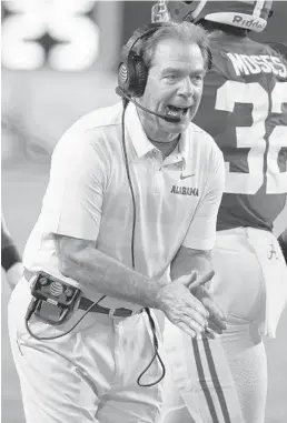  ?? WILFREDO LEE/AP ?? Alabama head coach Nick Saban cheers on his team during the second half of its Orange Bowl win over Oklahoma on Dec. 29.