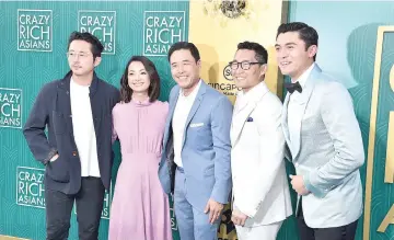  ?? — AFP photo ?? Steven Yeun, Jae Suh Park, Randall Park, Daniel Dae Kim and Henry Golding attend the premiere of ‘Crazy Rich Asians’ in Hollywood earlier this month.