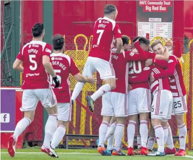  ??  ?? Winning feeling Hamilton players show their joy at David Templeton’s late winner