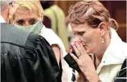  ?? Picture: EUGENE COETZEE ?? POOR WITNESSES: Christine and Chantell Russouw speak to their lawyer, Hans Bester, following their murder conviction­s in the Port Elizabeth High Court