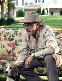  ??  ?? LBJ (Bryan Cranston) and his pet beagle in a scene from “All the Way,” an HBO original film.