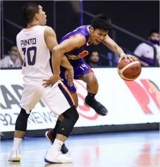  ?? PHOTOGRAPH COURTESY OF PBA ?? MARK Barroca of Magnolia tries to breeze past the defense of Nard Pinto of Meralco during their PBA Philippine Cup game last night at the AUF Arena in Pampanga.