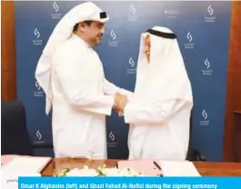  ??  ?? Omar K Alghanim (left) and Ghazi Fahad Al-Nafisi during the signing ceremony