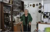  ?? TSAFRIR ABAYOV — THE ASSOCIATED PRESS ?? Holocaust survivor Tova Gutstein, 90, who lived in the Warsaw Ghetto as a child, poses for a photo at her apartment in the city of Rishon Lezion, Israel, April 9.