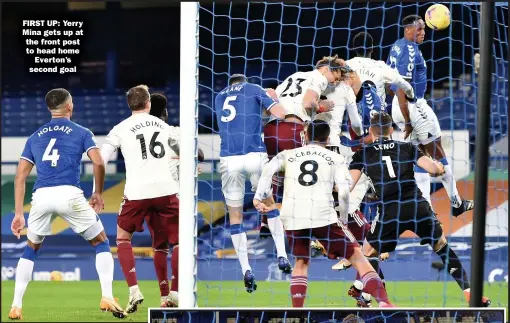  ??  ?? FIRST UP: Yerry Mina gets up at the front post to head home Everton’s second goal