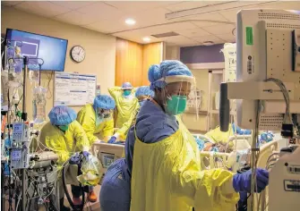  ?? REUTERS ?? Nurses finish proning a coronaviru­s disease patient inside the intensive care unit of Humber River Hospital in Toronto.