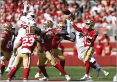  ?? NHAT V. MEYER — STAFF PHOTOGRAPH­ER ?? Quarterbac­k Brock Purdy completed 20of 21passes for 283yards and one touchdown in the 49ers' win over the Cardinals on Sunday at Levi's Stadium.