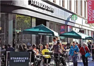  ??  ?? Chain: Starbucks runs UK stores including this branch in Buchanan Street, Glasgow