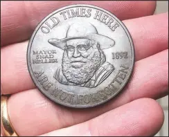  ?? Courtesy Photo ?? Mulik recently uncovered this silver Dollar City token in a Goodman yard. he estimates the token was in circulatio­n in 1992.