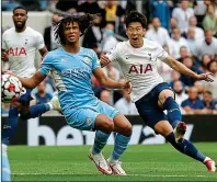  ?? ?? Spurred on: Heung-min Son scores the goal that defeated City again at Tottenham’s new stadium in 2021