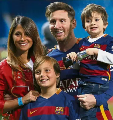  ??  ?? Barcelona star Lionel Messi posing for a photograph with his fiance Antonella Roccuzzo and sons Thiago (bottom) and Mateo after winning the final of the Spanish King’s Cup at the Vicente Calderon last May. Messi will be marrying Roccuzzo today. One...
