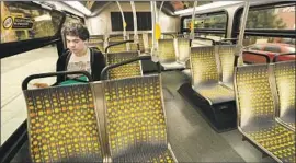  ?? Al Seib Los Angeles Times ?? STEVE VAL takes a Metro bus through downtown Los Angeles in February. Over the past five years, ridership on the agency’s bus system has declined nearly 21%.