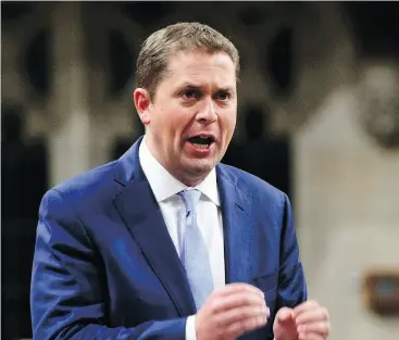  ?? SEAN KILPATRICK / THE CANADIAN PRESS ?? Conservati­ve Leader Andrew Scheer, in the House on Wednesday, told Justin Trudeau to “bring it on” when the PM vowed an election fight over the carbon tax plan.