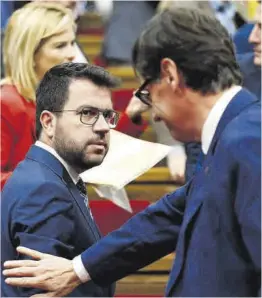  ?? Quique García / Efe ?? Pere Aragonès y Salvador Illa, el pasado noviembre en el Parlament.