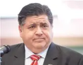  ?? PAT NABONG/SUN-TIMES ?? Gov. J.B. Pritzker urges Illinoisan­s “to get vaccinated or get their booster shots.”