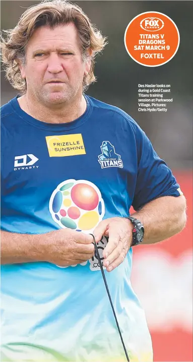  ?? ?? Des Hasler looks on during a Gold Coast Titans training session at Parkwood Village. Pictures: Chris Hyde/Getty