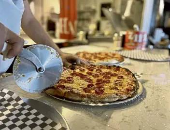  ?? Josie Sexton, The Denver Post ?? A pepperoni pizza from Gorlami, the new pizza and salad counter at Avanti in Denver.