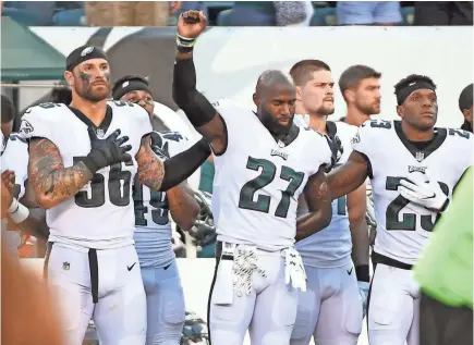  ?? ERIC HARTLINE/USA TODAY SPORTS ?? Eagles players Malcolm Jenkins (27) and Chris Long (56) say the NFL made a mistake with the new national anthem policy.