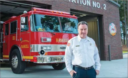  ?? WILLIAM HARVEY/TRI LAKES EDITION ?? Haskell Fire Chief Brian Cotten stands in front of the city’s third fire station, which was completed in November 2015. The 2,500-square-foot metal structure, which is called Haskell Fire Station 2, was built by eco Constructi­on of Little Rock, with engineerin­g by Heritage Engineerin­g Co. of Benton, and features all LED lighting.