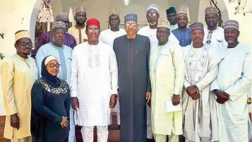  ?? ?? The NIQS President, Kene Nzekwe and other members during a courtesy visit to former president, Muhammadu Buhari, at his residence in Daura