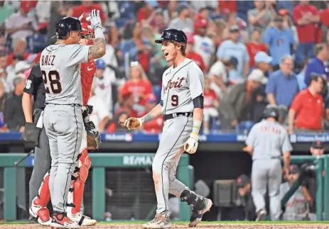  ?? ERIC HARTLINE/USA TODAY SPORTS ?? Tigers third baseman Nick Maton, right, celebrates his three-run home run with shortstop Javier Baez during the seventh inning against the Phillies on Monday in Philadelph­ia.