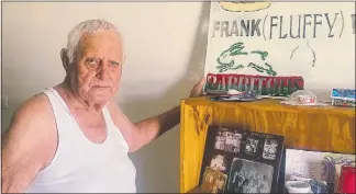  ?? PHOTO: DUBBO PHOTO NEWS ?? Frank Wooding reflecting on his younger years with a poster dedicated to him.