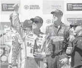  ?? SARAH CRABILL/GETTY IMAGES ?? Kevin Harvick celebrates in victory lane after winning the Monster Energy NASCAR Cup Series Toyota/Save Mart 350 at Sonoma Raceway on Sunday.