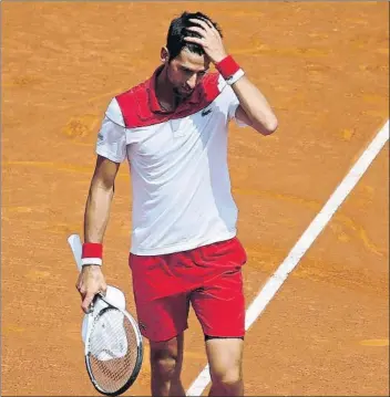  ?? FOTO: PEP MORTATA ?? Novak Djokovic, otro paso atrás en su recuperaci­ón al perder contra Klizan en su regreso a Barcelona