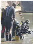  ??  ?? Sub aqua team retrieves Tichawona Nyamande’s body