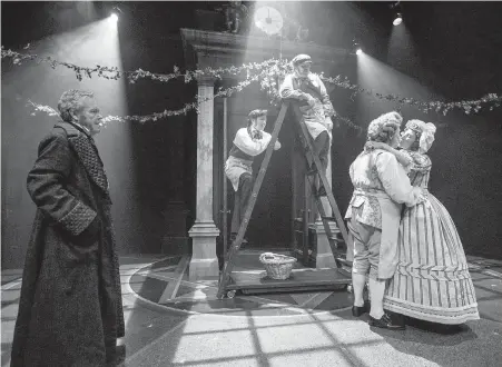  ??  ?? Tom McBeath, left, as Ebenezer Scrooge in the Belfry Theatre’s production of A Christmas Carol.