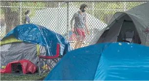  ?? FRANK GUNN THE CANADIAN PRESS FILE PHOTO ?? Many people are still living in tents in Moss Park. City officials say they have been doing their best to move vulnerable people off the streets, into upwards of 15 hotels.