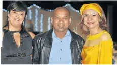  ??  ?? FORMER SCHOOLMATE­S: Rochelle Redcliffe, left, Rolan Lottering and Gishma Johnson attended Chapman High School’s reunion dinner, which was held recently