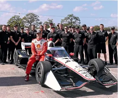  ??  ?? Supercars champion Scott McLaughlin with the IndyCar he tested in for Team Penske.