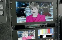  ?? PHOTO: REUTERS ?? Scotland’s First Minister Nicola Sturgeon is seen on screens in a television production truck as she demands a new independen­ce referendum, outside Bute House in Edinburgh.