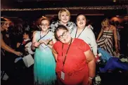  ??  ?? Emmie Humphreys, LaDachia Donaldson and Alexis Oglesby all stopped to pose for a picture with Director of Special Education for Rome City Schools Kristi Kilpatrick during the Night to Shine Event.