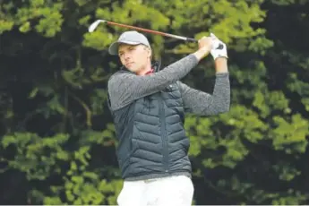  ??  ?? Jordan Spieth, hitting a tee shot in the first round of the 146th British Open, didn’t post a bogey Thursday and fired a 5-under-par 65. He called his score “extremely important.”