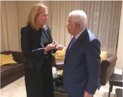  ?? (Courtesy) ?? HATNUA LEADER Tzipi Livni confers with Palestinia­n Authority President Mahmoud Abbas on September 25.