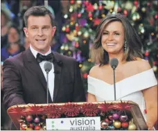  ??  ?? Timely tradition: David Campbell and Lisa Wilkinson have hosted Carols by Candleligh­t since 2013.