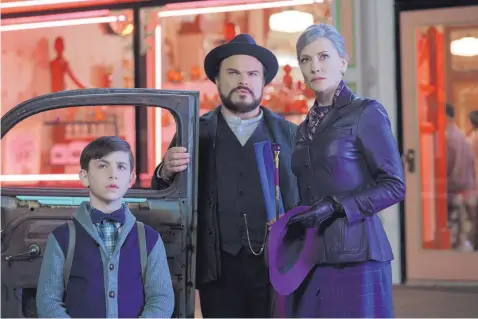  ?? COURTESY OF UNIVERSAL PICTURES ?? Owen Vaccaro, left, Jack Black and Cate Blanchett in a scene from “The House With a Clock in Its Walls.”