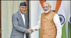  ?? AJAY AGGARWAL/HT PHOTO ?? Prime Minister Narendra Modi with his Nepalese counterpar­t Sher Bahadur Deuba in New Delhi on Thursday.