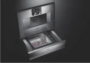  ??  ?? TOP TO BOTTOM Gaggeneau’s combi-steam oven not only has an array of cooking functions, it is also space-saving; a sleek galley kitchen designed by The Kitchen Society