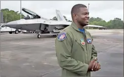  ??  ?? F-22 Raptor Demo Team leader Major Paul “Loco” Lopez, addresses members of the media after other pilots flew two F-22s into Dobbins Air Reserve Base, where they will stage for the Wings Over North Georgia air show this weekend. / Kelly J. Huff-MDJ