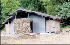  ?? Lynn Atkins/The Weekly Vista ?? Although there’s still more landscapin­g to be done, the updated restroom facility at Blowing Springs Park is open. The building was winterized so it can be open year round and the showers can be used by tent campers or trail users.