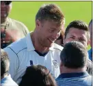  ??  ?? CENTRE STAGE: Flintoff is a popular figure at St Annes yesterday afternoon