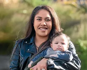  ??  ?? Phoebe Tomlinson with son Malachai Tomlinson-Papuni, who was the first baby to be born in Taranaki during lockdown.