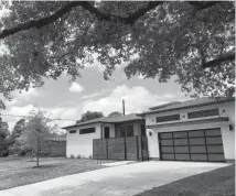  ?? Katherine Feser / Houston Chronicle ?? This house is on the market in the Willow Meadows neighborho­od in southwest Houston. Area values are up sharply.