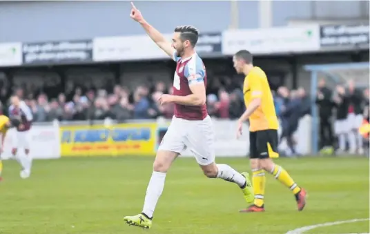  ?? KEVIN WILSON ?? Carl Finnigan celebrates after opening the scoring for South Shields in their 2-1 FA Trophy win over Hyde