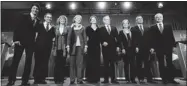  ?? DARRYL DYCK/ THE CANADIAN PRESS ?? Federal Liberal leadership candidates Justin Trudeau, left, Martin Cauchon, Karen McCrimmon, Joyce Murray, Martha Hall Findlay, George Takach, Deborah Coyne, David Bertschi and Marc Garneau meet for a debate in Vancouver.